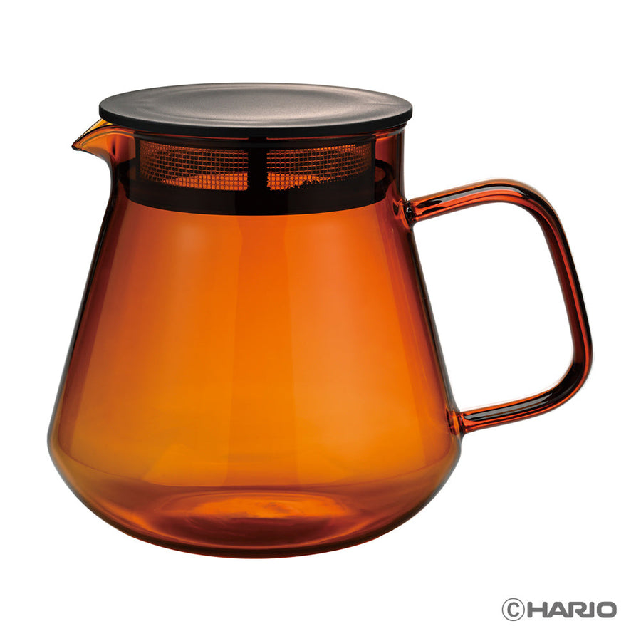 Amber glass coffee server with a black rim on a white background, featuring the Hario logo.