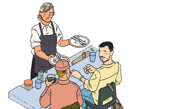 Ozone Coffee Roasters – staff serving food to guests at a table with drinks and condiments, casual dining scene.