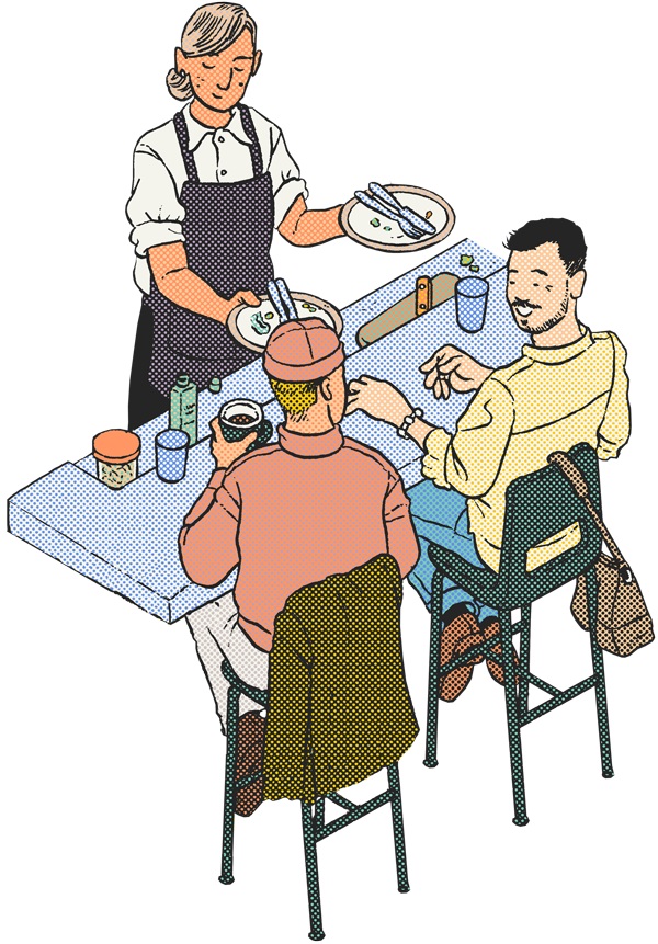 Ozone Coffee Roasters – staff serving food to guests at a table with drinks and condiments, casual dining scene.