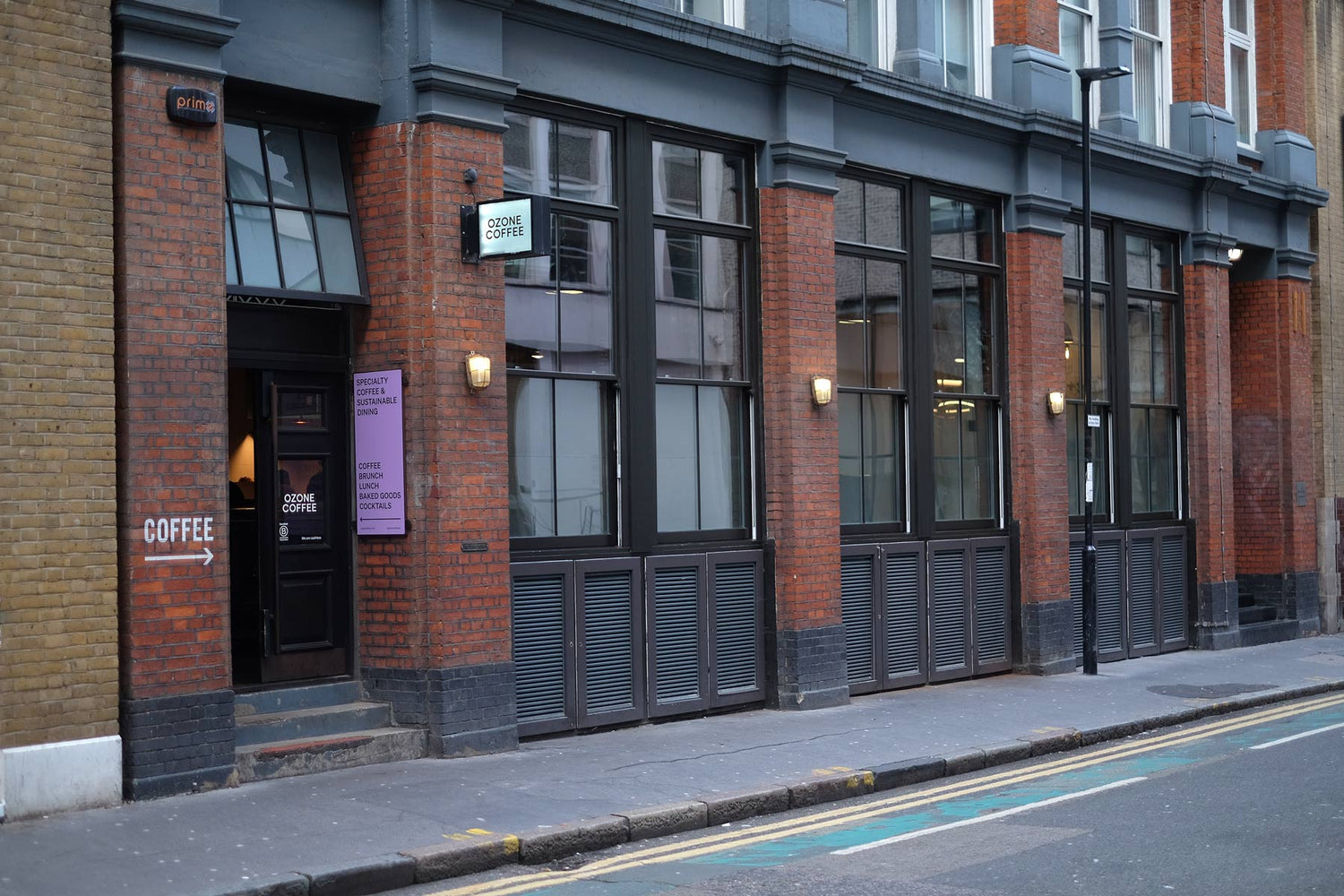 Ozone Coffee Roasters Shoreditch – brick exterior near Old Street roundabout with black-framed windows and branded signage.