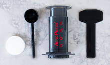 Load image into Gallery viewer, Ozone Coffee Roasters: AeroPress Classic Coffee Maker and included accessories
