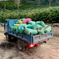 A truck loaded with freshly harvested coffee from the region of Samaipata heads towards Agricafe's mill for processing