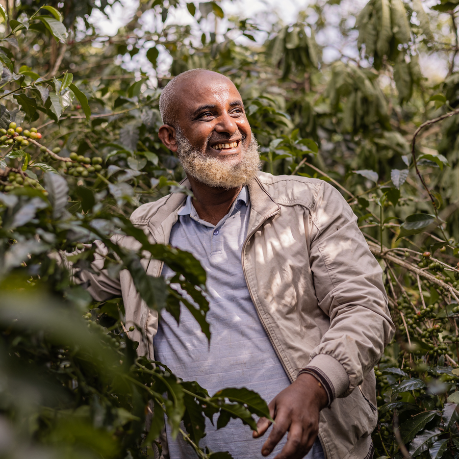 Mensur Abahika with his coffee in Jimma, Ethiopia