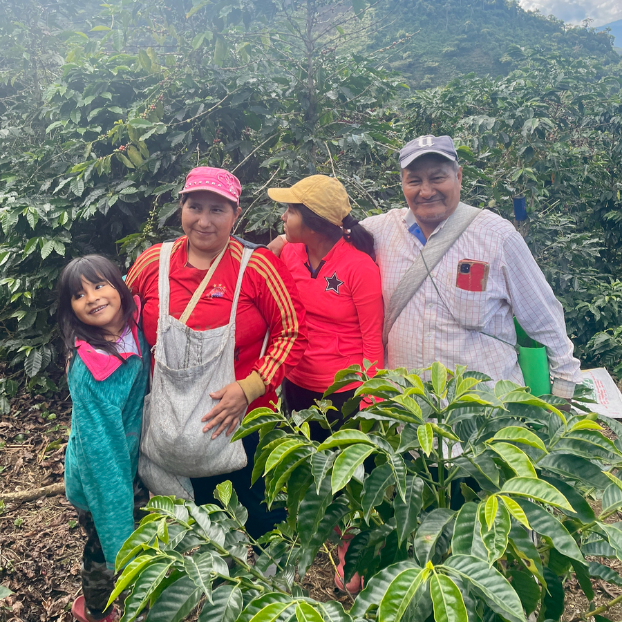Nancy & Gregorio Palli together with their daughters on their farm Volcan del Tigre in Copacabana, Bolivia