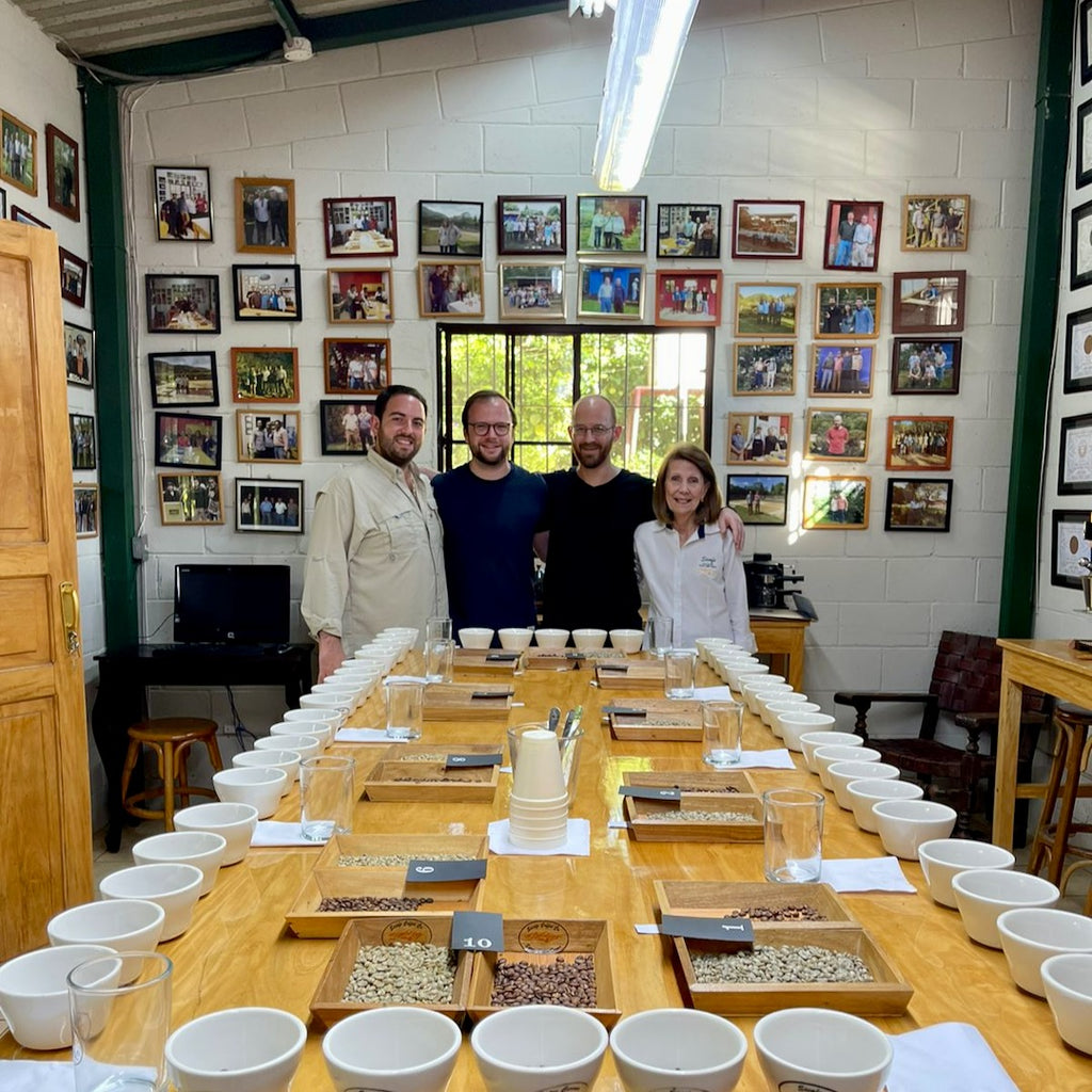 Rafael Jnr, Head of Production Ollie, Green Buyer Roland and Carmen Silva at their cupping lab