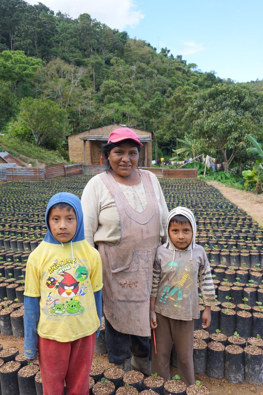Daisy Paye Mamani and her 2 sons photographed at Volcán del Tigre
