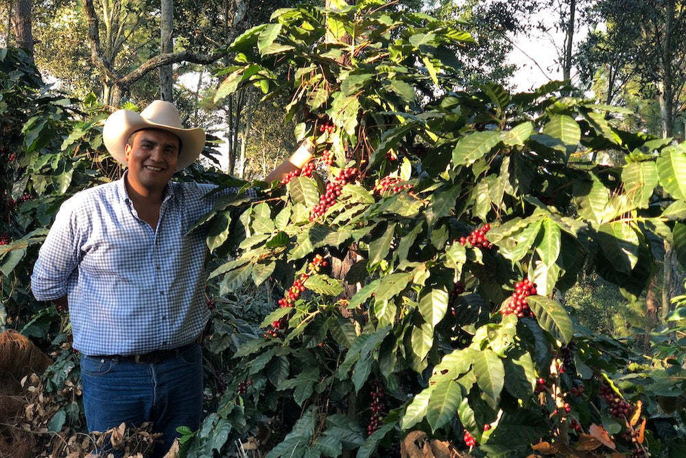 Betio Reyes with the coffee he grows at El Limon in Palencia, Guatemala