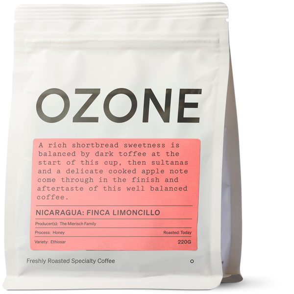 Packaging of Ozone freshly roasted specialty coffee, with the text 'Nicaragua: Limoncillo, Ethiosar, Honey' indicating the coffee variety and processing system. The bag is white with a label and additional text.